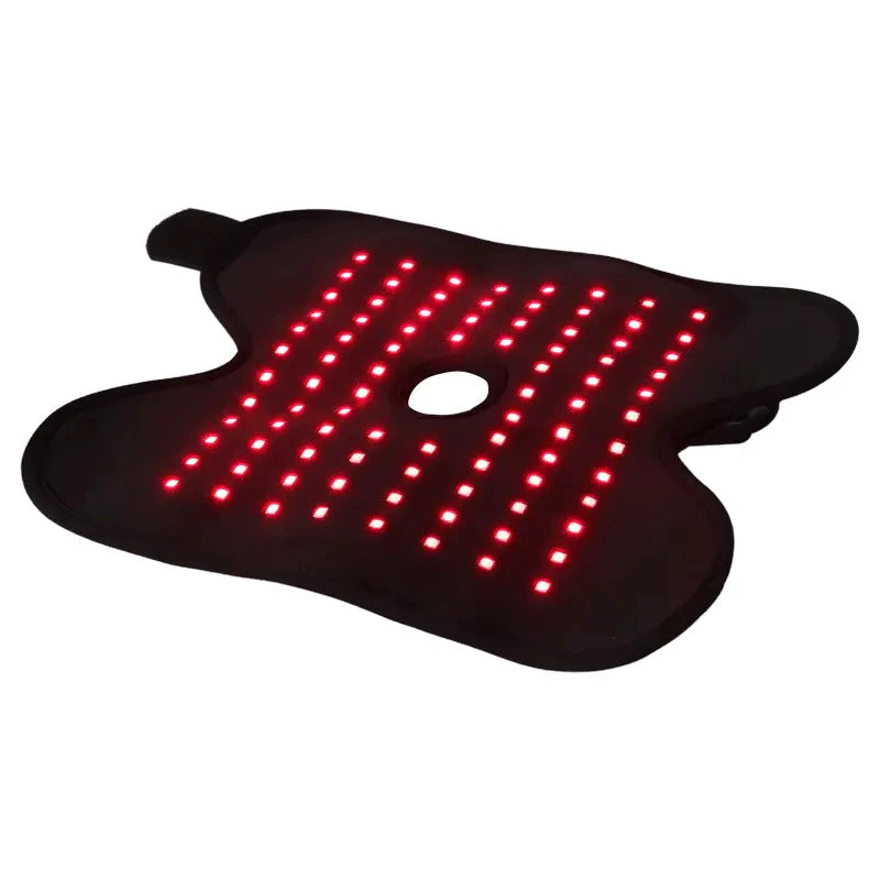 Black fabric ankle-wrap pad with a grid of red LED dots and a central circular opening.