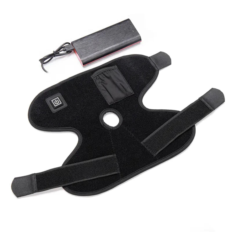 Black neoprene ankle wrap with Velcro straps, circular center hole, power button patch, and a red-light battery pack.